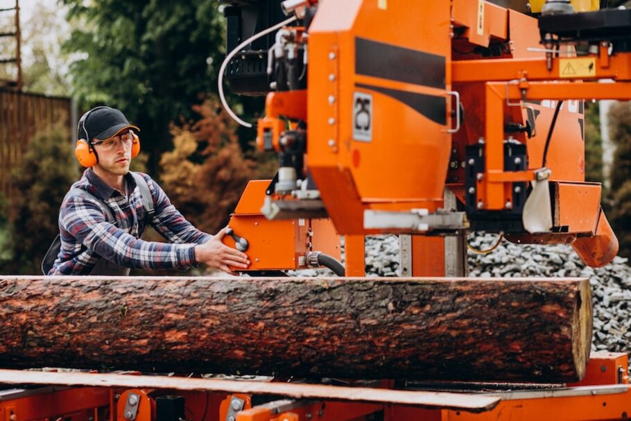 carpenter-working-on-a-sawmill-on-a-wood-manufacture_1303-22889.jpg